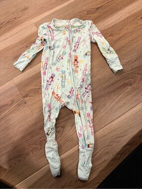 Posh Peanut Light Mint Nutcracker Print Footed One-Piece